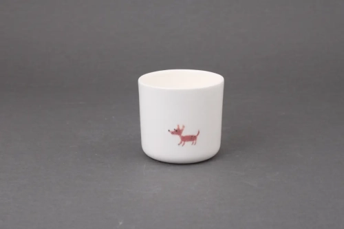 Porcelanowy kubek bez ucha z rysunkiem pieska