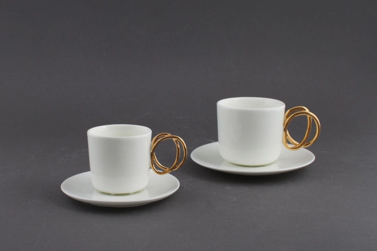 Filiżanki espresso i cappuccino Twist ze złotym uchem Ende Ceramics